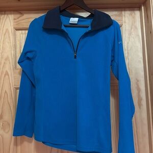 Ladies, pullover, top size medium, aqua blue color used lightweight material